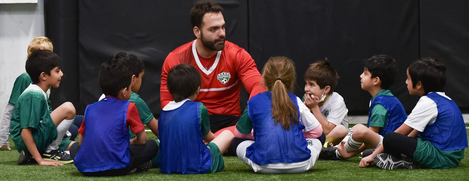 A full team huddling together